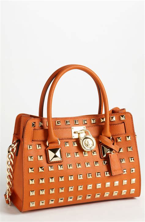 michael kors orange studded purse|Michael Kors orange backpack.